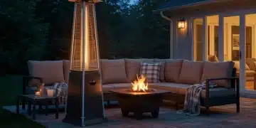 Cozy patio at dusk with a modern patio heater and a rustic fire pit, extending outdoor season enjoyment.
