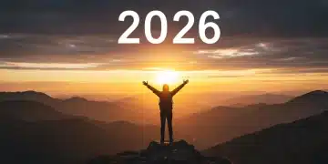 Sunrise over mountains, person celebrating personal growth and potential in 2026