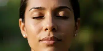 Serene person practicing breath mindfulness for stress reduction