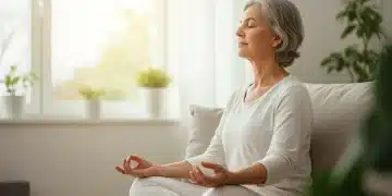 Person meditating peacefully in a sunlit room, embodying calm and stress reduction.