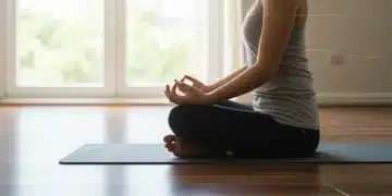 Person meditating peacefully to reduce anxiety and panic attacks